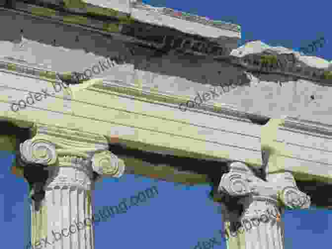 A Beautiful Ancient Greek Temple With Ionic Columns, Intricate Carvings, And A Triangular Pediment Stands Tall Against A Blue Sky. Unbelievable Pictures And Facts About Ancient Greece