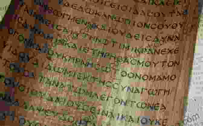 A Close Up Of An Ancient Greek Manuscript, With Intricate Calligraphy And Faded Ink, Reveals Fragments Of The Iliad And Odyssey. Unbelievable Pictures And Facts About Ancient Greece