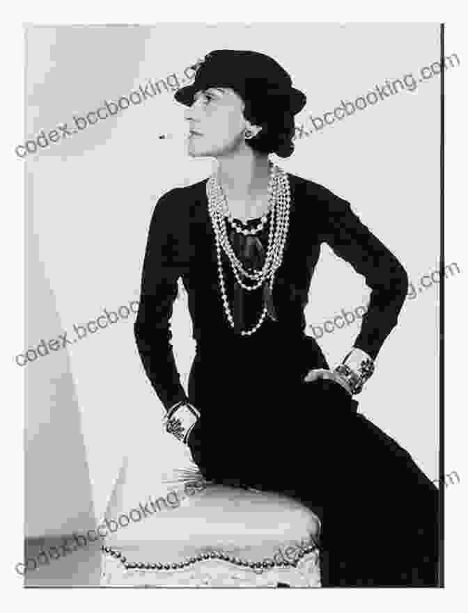 A Close Up Portrait Of Coco Chanel, Showcasing Her Signature Pearls And Little Black Dress. Conversations: Up Close And Personal With Icons Of Fashion Interior Design And Art