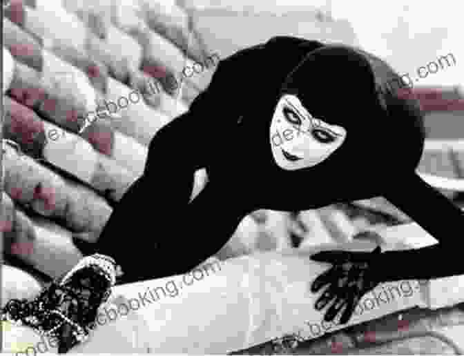 A Striking Black And White Image Of Musidora In Costume As Irma Vep, Brandishing A Weapon Zones Of Anxiety: Movement Musidora And The Crime Serials Of Louis Feuillade (Contemporary Approaches To Film And Media Series)
