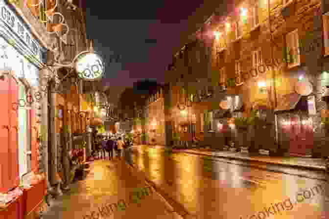 Illuminated Buildings And Cobblestone Streets In Quebec City At Night. Frommer S EasyGuide To Montreal And Quebec City