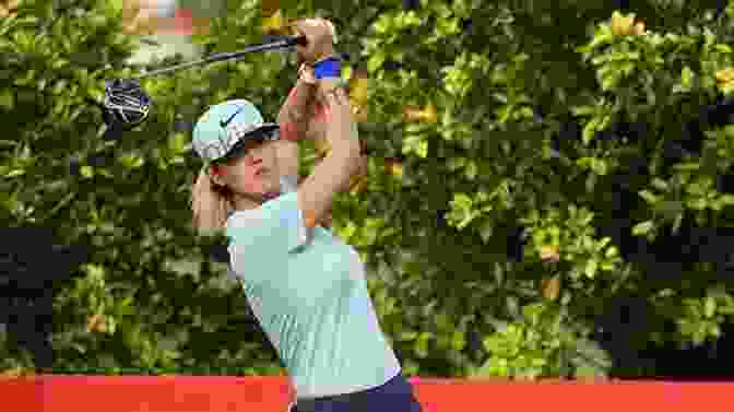 Michelle Wie Teeing Off During A Golf Tournament The Sure Thing: The Making And Unmaking Of Golf Phenom Michelle Wie