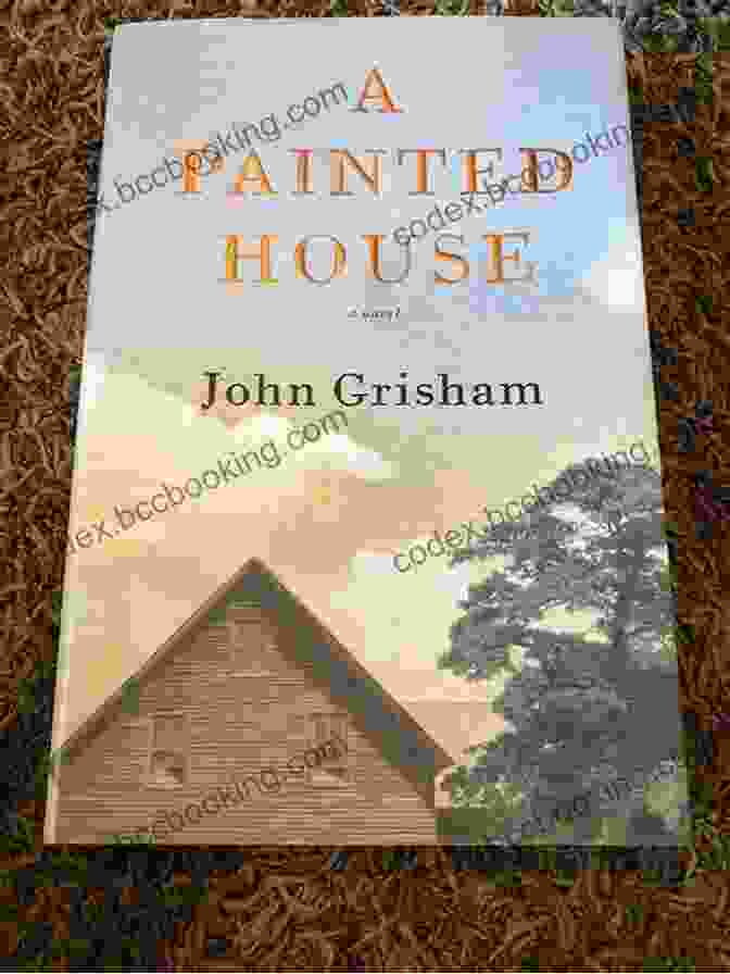 Painted House Novel Cover With A Faded Rural House Against A Warm Sunset Sky A Painted House: A Novel