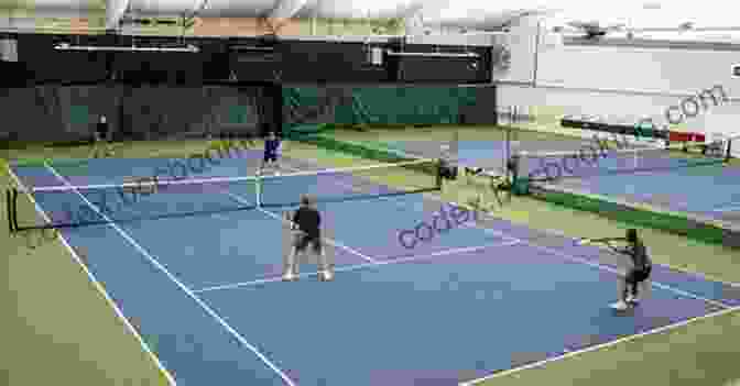 People Playing A Fun Variation Of Indoor Tennis The Mini Of Indoor Tennis Games : A Play At Home Tennis
